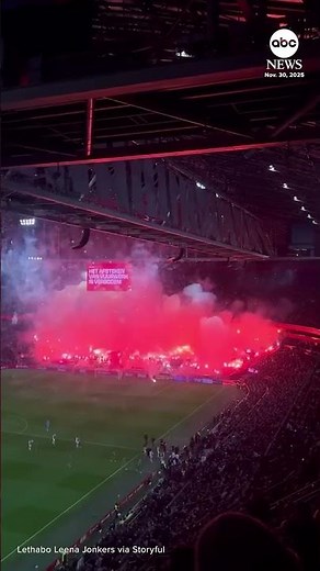 Dutch soccer match abandoned after fans set off fireworks in stands
