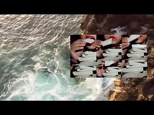 View from Above on Waves Hitting Rocky Shore