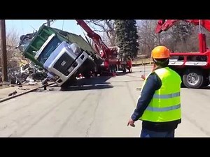 Truck Tips Over and Gets Pulled Upright With 2 Large Tow Trucks