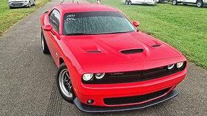 Possessed by Demons: This All-Stock Dodge Challenger Scat Pack 1320 Runs 11.30s
