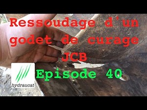 Resoudage d'un godet de curage JCB