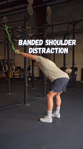 Banded Shoulder Distraction 🤌🏻 Classic shoulder opener. I like to add some rotation in from the shoulder with this one while the band is distracting my shoulder, & if a certain position feels tight, I will spend some extra time there! Also, be sure to tuck the rib cage down to ensure you’re not flaring the rib cage! Save & send to a friend who wants to improve their shoulder mobility! We offer 1:1 Remote Rehab Coaching and share valuable rehab tips right here! Save this post & follow for exper
