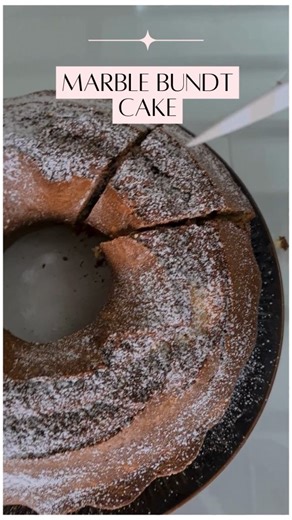 This is one of those timeless cakes that remind us of home. Soft, moist, and beautifully marbled with chocolate and vanilla, this Macedonian-style kuglof is perfect for coffee gatherings or lazy Sunday mornings. The aroma fills the house, and the first slice always disappears before it cools down. Simple to prepare, impressive to serve. It’s light, fluffy, and full of that cozy balance between vanilla and cocoa. Full recipe in story and on web. | Macedonian Cuisine