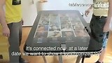 58寸超大触摸桌Table Connect 可以将iPhone 4通过一个连接器与该桌面进行连接。玩起游戏来应该很爽吧~