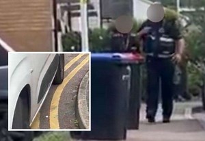 Traffic wardens accused of issuing fine while parked on double yellows