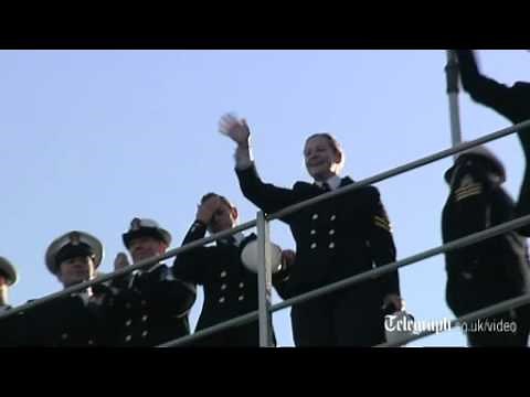 HMS Ocean returns home after "All I Want for Christmas" video hit