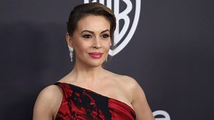 Alyssa Milano removed her breast implants to "let go of the body that was sexualized"
