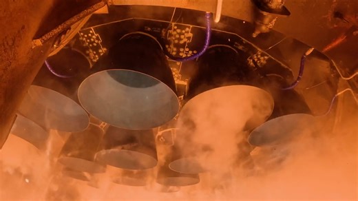 33 Raptor engines powering the Super Heavy booster off the pad from Starbase | SpaceX