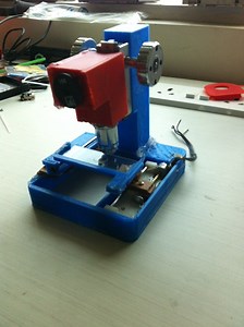 Low Cost Digital Microscope With Automated Slide Movement