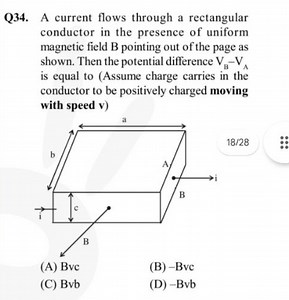 Q34. A current flows through a rectangular conductor in the pre... | Filo