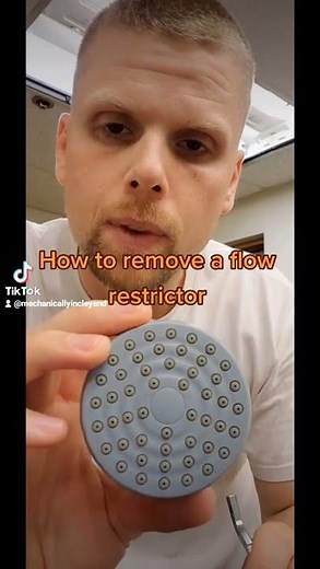How to remove a flow restrictor on a shower head #shorts #plumbing
