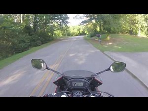 Neighbor's dog chasing motorcycle