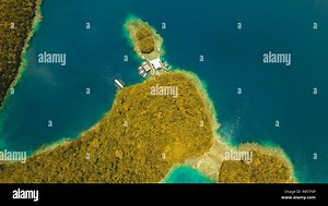 Aerial view: Bucas Grande Island, Sohoton Cove. Philippines. Tropical sea bay and lagoon, beach. Tropical landscape hill, clouds and mountains rocks with rainforest. Azure water of lagoon. Shore Landscape Bay. Aerial video.Seascape. Travel concept Stock Photo - Alamy