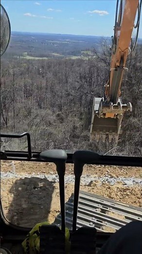 spreading Rip Rap rock with an excavator # shorts