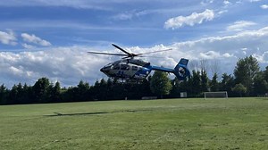 Two workers injured after being run over by paving roller in Windham, authorities say