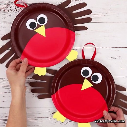 9.9K views · 377 reactions | These cute robins are really easy to make and so sweet with their HANDPRINT WINGS! https://kidscraftroom.com/paper-plate-robin-craft/ | Kids Craft Room | Facebook