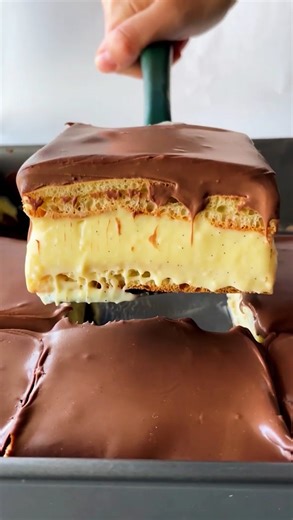 Carolina Gelen | ECLAIR CAKE — all the elements of a classic eclair, sandwiched in a square pan for a sliceable crowd-pleaser Recipe here:... | Instagram