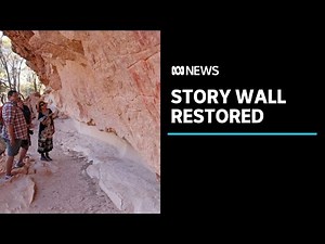 Towering indigenous art story wall restored in outback Queensland | ABC News
