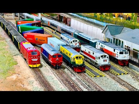 The long train convoy CC300, CC201 & CC206 accelerated around a sharp bend until the container ov...
