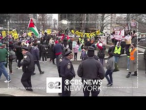 Pro-Palestinian demonstrators march through NYC on New Year's Eve