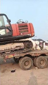 बिना रैंप के टेलर से मशीन को उतारते हुए #automobile #constructionequipment #tatahitachiexcavator