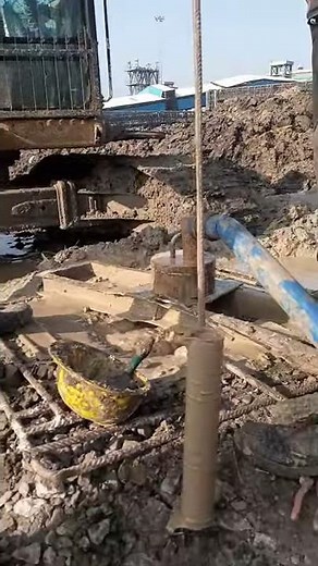 Pile foundation - Bentonite flushing and density checking.