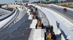 Dallas Snow Plows Clear and Treat Roads Ahead of Refreeze