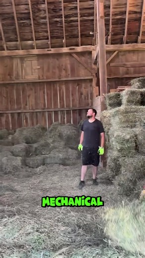 A simple chain conveyor lifts each hay bale to the loft. #FarmEngineering #HayStorage #Satisfying | Factory Monster