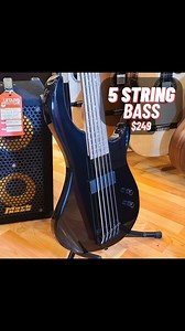 DEAN EDGE 09 5 STRING - CLASSIC BLACK $249.00 The great-playing and very affordable Dean Edge 09 5-String Electric Bass Guitar features a basswood body contoured for playing comfort. The maple neck is profiled to be fast, sleek, and easy to play. A unique Dean-design neck joint and heel along with an asymmetrical 4-bolt pattern give you unhindered movement all the way up the 2-octave neck. 35" scale for improved string tension. Soapbar pickups serve up the right rumble. #5string #5stringbass #de