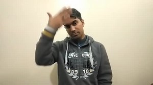 Watch how to sign 'expressionless' in American Sign Language.