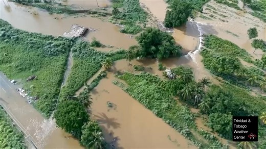 4:30 PM - Aerial view of the breach of the Macoya River, a tributary to the Caroni River, showing freely flowing water still inundating Trantrill Road and the Caroni Plains. A Riverine Flood Alert remains in effect for the Caroni River Basin and South Oropouche River Basin. 🎥: Joshua Lutchman Live updates continue: https://ttweathercenter.com/2025/06/13/live-updates-flooding-high-winds-affecting-tt | Trinidad and Tobago Weather Center
