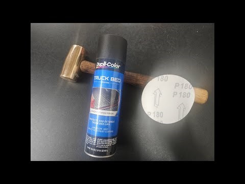 Bed liner coating on a tool handle.