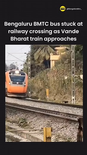 A Bengaluru Metropolitan Transport Corporation (BMTC) bus carrying more than 10 passengers got stuck on a railway track at Ramohalli railway crossing near Kengeri as the Mysuru-Chennai Vande Bharat train approached. BMTC sources said the incident occurred around 7:15am on April 1 near Ramohalli railway crossing. The bus (KA 57 F 2939), belonging to Depot-21 (RR Nagar) and operating on route no. 227J/1 (Maligondanahalli - KR Market), became stranded on the track. | Bangalore Bro