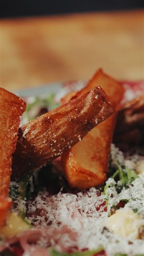 1.4K views | Plated to perfection ✨ Every component of our beef carpaccio is intentional - from the delicate cut to the bold garnish. Smoked tallow aioli, fried capers, pickled shallots, and Grana Padano. This isn’t just an appetizer - t’s a statement. Available for a limited time, only at Chop Steakhouse. Book now at chop.ca  | Chop Steakhouse & Bar | Facebook