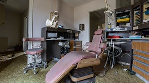 Abandoned dental clinic left frozen in time with teeth & needles after disaster