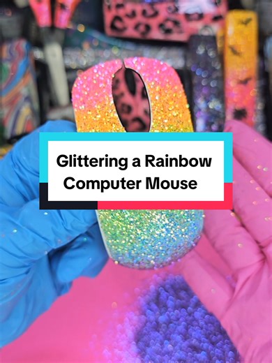 Replying to @treymagnifiqueboutique Let me show you how to decorate a computer mouse with a rainbow glitter theme while we talk about sanding. 🥰✨️💕 #glitter #rainbow #mouse #diycrafts #craftideas
