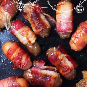 Indulge in our truffle pigs in blankets starter. 10 pigs in blankets lovingly covered with a salted truffle flavour and parsley glaze. Treat yourself! | The Spring River