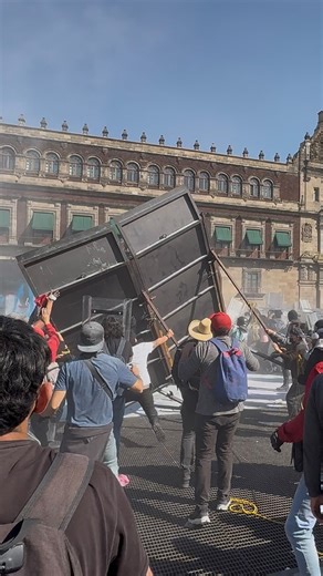 7.9K views · 5.7K reactions | Protesters against Mexican President Claudia Sheinbaum and the Morena party took down part of the barrier wall outside the National Palace in Mexico City today | BG On The Scene | Facebook