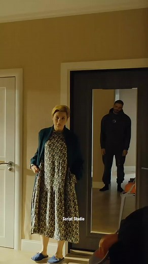 Floral Dress Meets Dark Hoodie in Indoor Scene