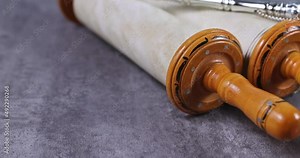 Prayer book with torah scroll and prayer shawl tallit Jewish Orthodox religious symbols Stock Video