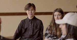 People engaging in group discussion. Students exchanging ideas, sharing opinions, discussing topics or issues collectively. Group discussions promote critical thinking, facilitate knowledge sharing.