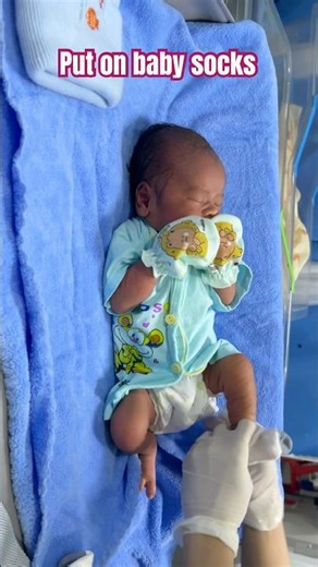 Put on baby socks #shorts