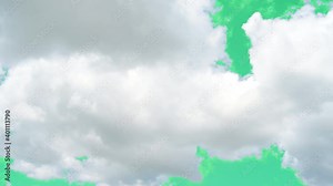 A green screen of moving white clouds with 4K resolution. Can use to change the background color.