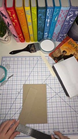That’s My Bookshelf 📚✂️ on Instagram: "Rebinding my books into the penguin clothbound classic aesthetic, one book at a time! Finally done with the Harry Potter series! Harry Potter and the Deathly Hallows Gold foil HTV from @cricut Bookcloth from @bookcraftsupply #harrypotter #bookstagram #harrypotterandthedeathlyhallows #penguinclothboundclassics #penguinclothboundclassicsrebinds #rebind #bookbinding #cricut #thatsmybookshelf"