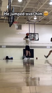 Insane dunk! Pro dunker jumps over 6'2" person