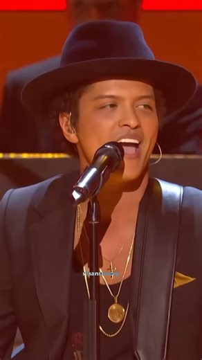 Rihanna Fan Account on Instagram: "Rihanna performing “Could You Be Loved” live at Grammy Awards in 2013 🧡 #rihanna #badgalriri #rihannavavy #grammy #2013 #brunomars #reels #viral #explorepage #explore"