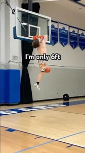 Six-foot dunker puts arm in rim with elbow dunk!