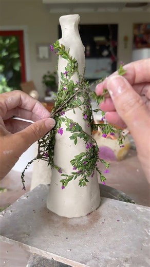 Pressing weeds into fairies #ceramic #ceramickiln #pottery