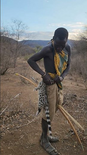 "Unbelievable moment! 😲 Hadzabe hunter beams with joy after a successful hunt —#Short #bushlife