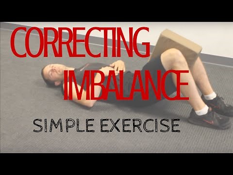 Hooklying Knee Pillow Squeezes